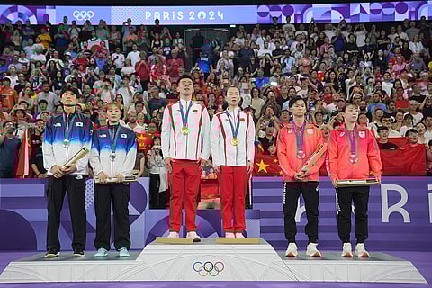 Badminton Mixed doubles: Silver medalists South Korea, gold medalists China and bronze medalists Japan